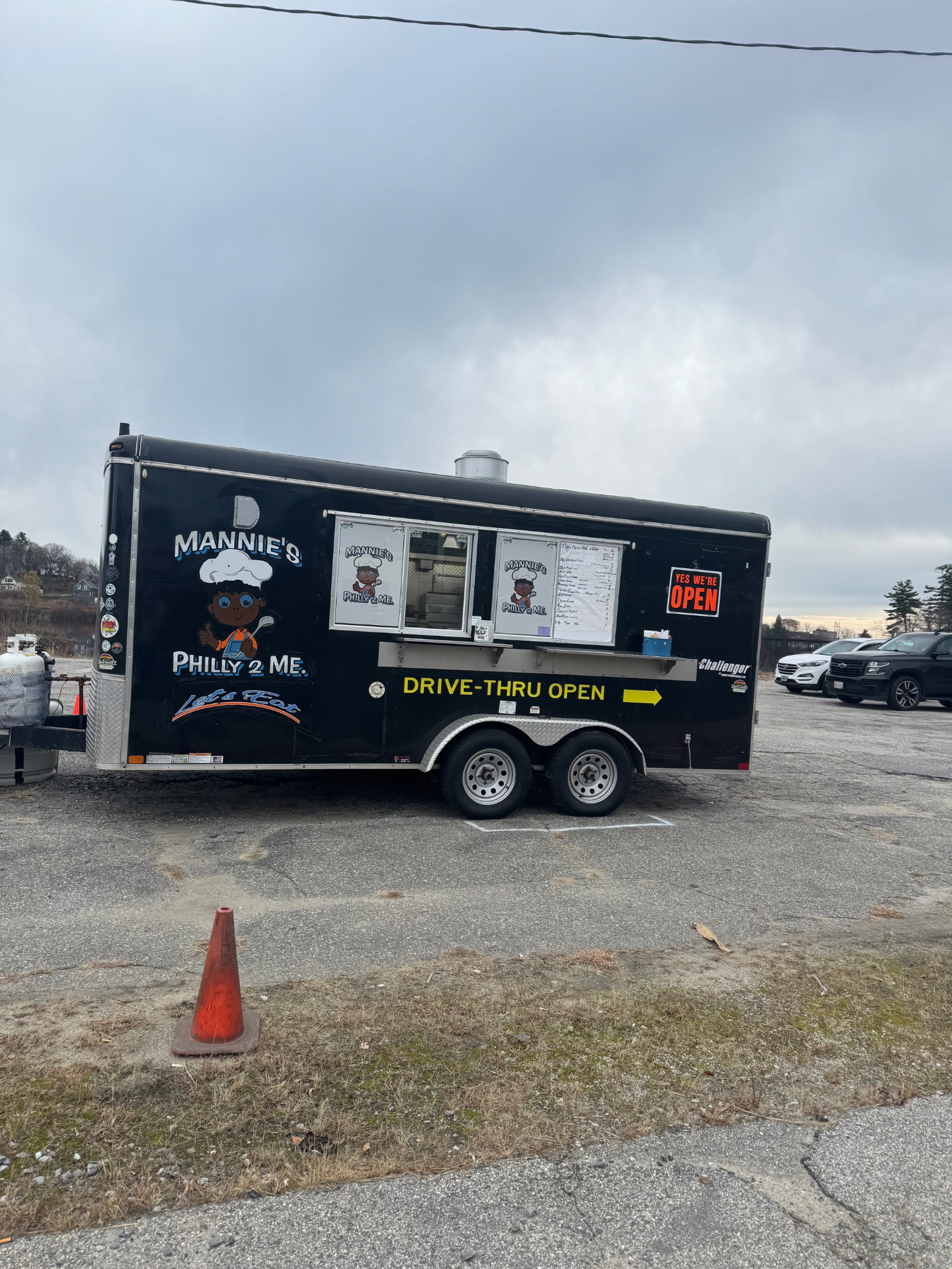 Mannies Philly 2 Me food truck parked and open for customers in Auburn, Maine